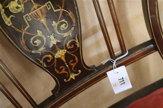An Edwardian inlaid mahogany elbow chair